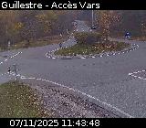 Webcam sur la D902 à Guillestre sur la route qui mène à la station de ski de Vars. Caméra située au niveau du rond-point à l'intersection avec la D902A