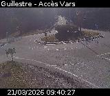 Webcam sur la D902 à Guillestre sur la route qui mène à la station de ski de Vars. Caméra située au niveau du rond-point à l'intersection avec la D902A